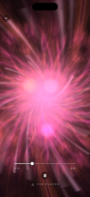 The Dreamscape visualizer: a soft pink and red bloom opening outward from the centre of the screen.